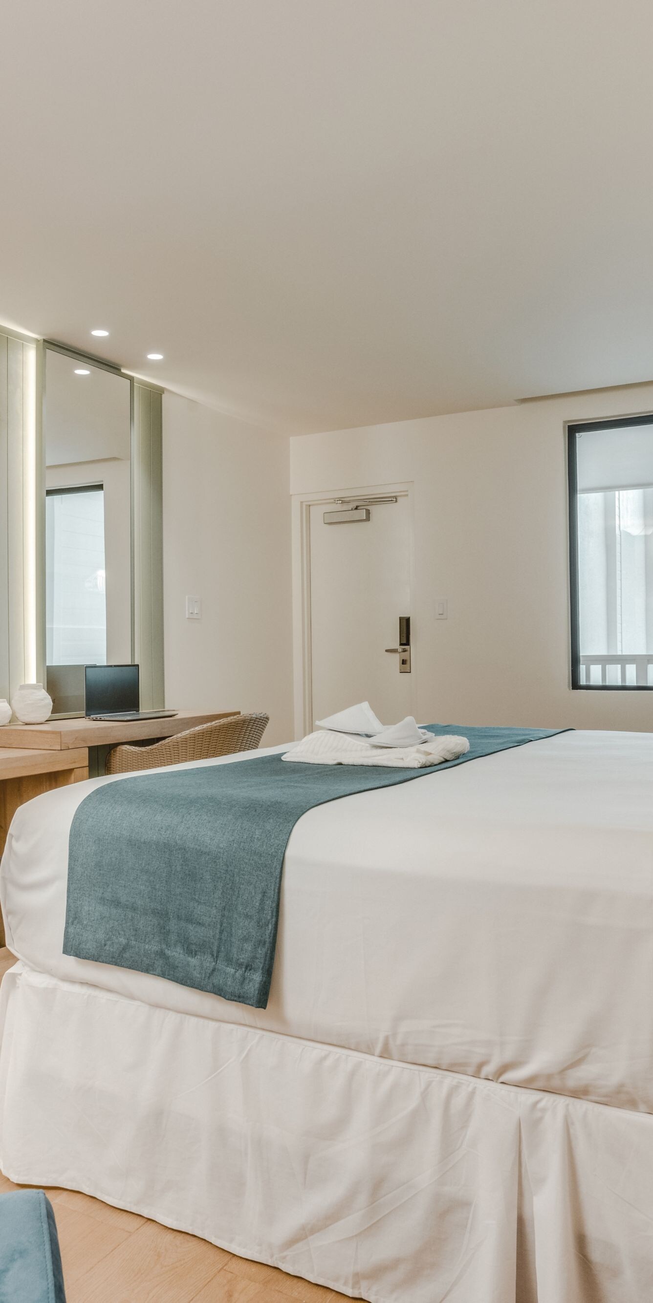 Bedroom with balcony and window