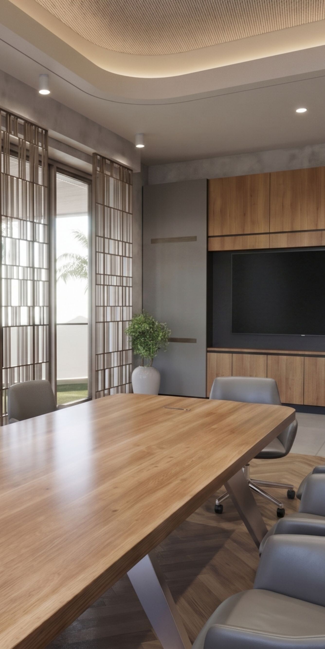 Boardroom with wood table and terrace view