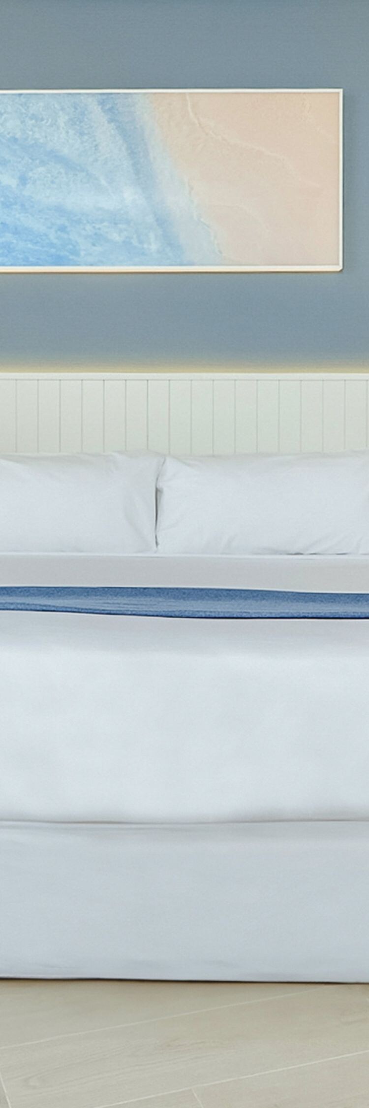 King bed with blue accent wall