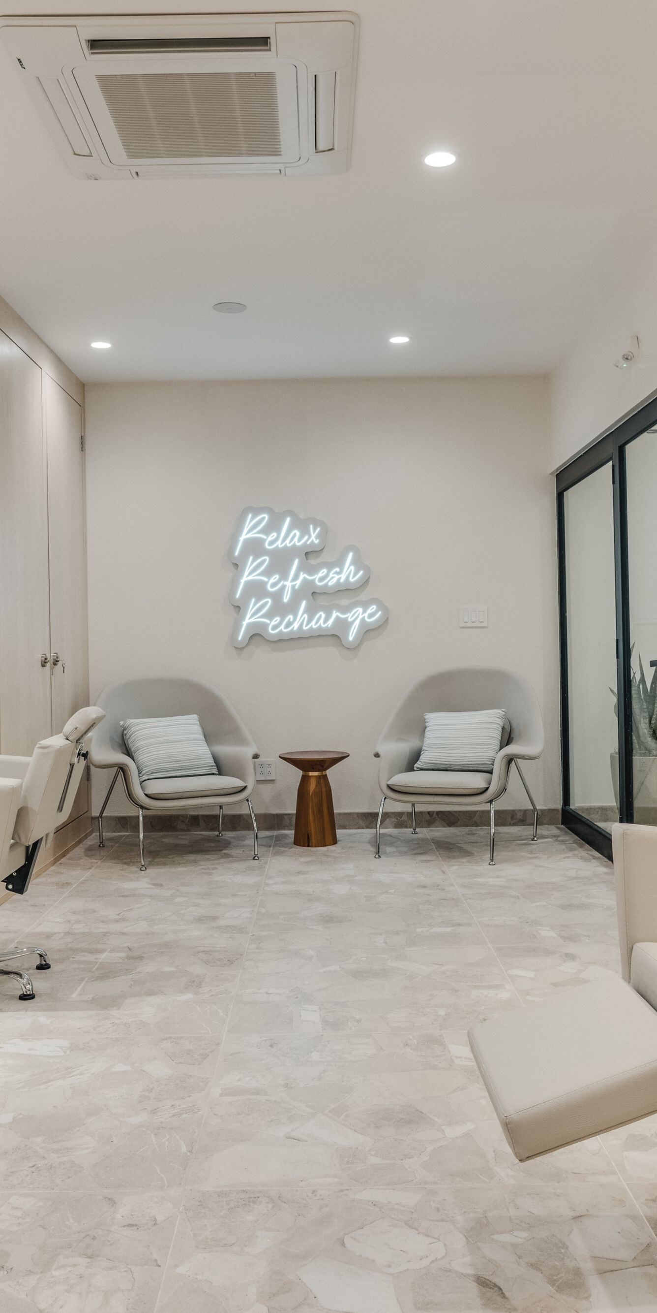 Salon chairs with mirrors and wash station
