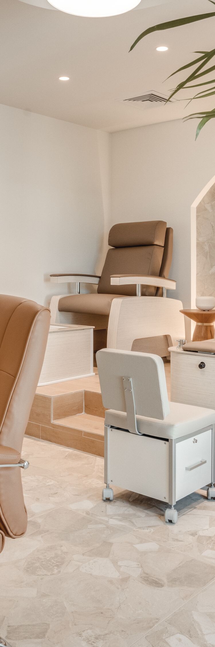 Manicure area with chairs and stations