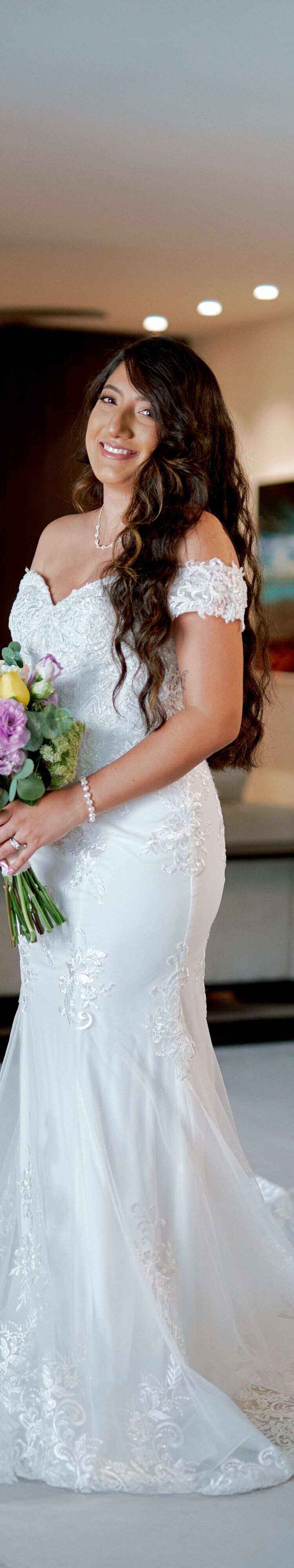  Person holding bouquet indoors