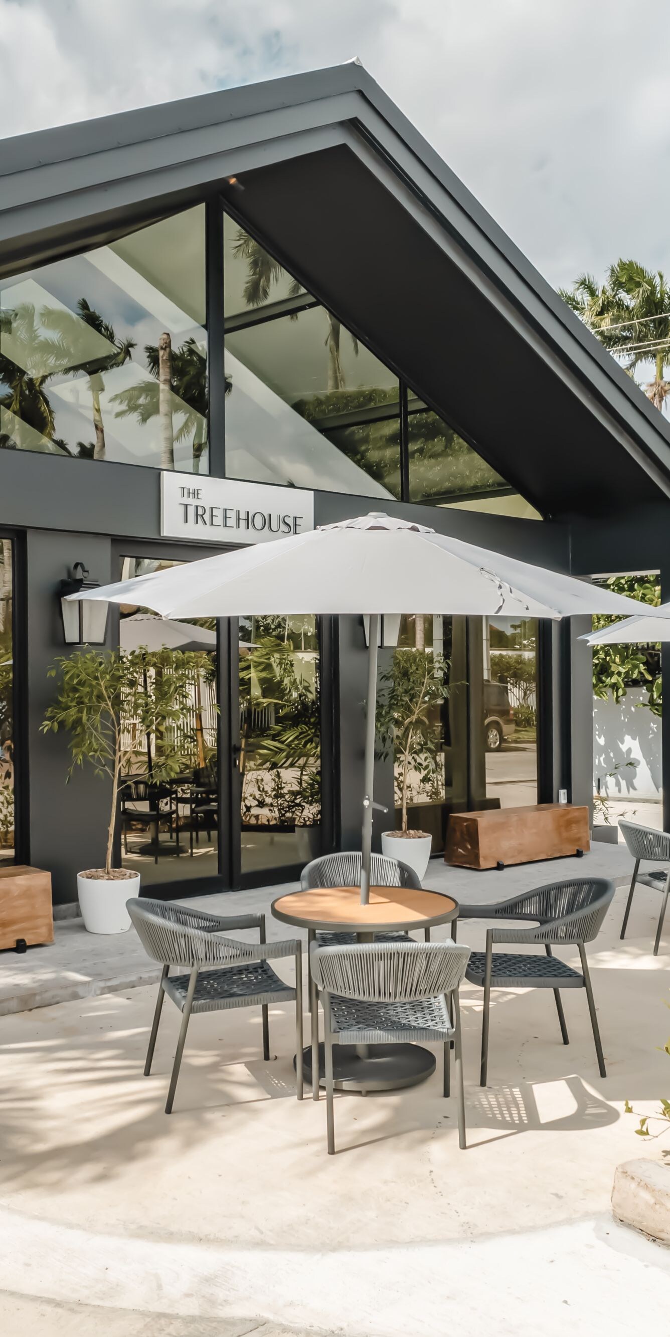 Outdoor patio with tables and umbrellas