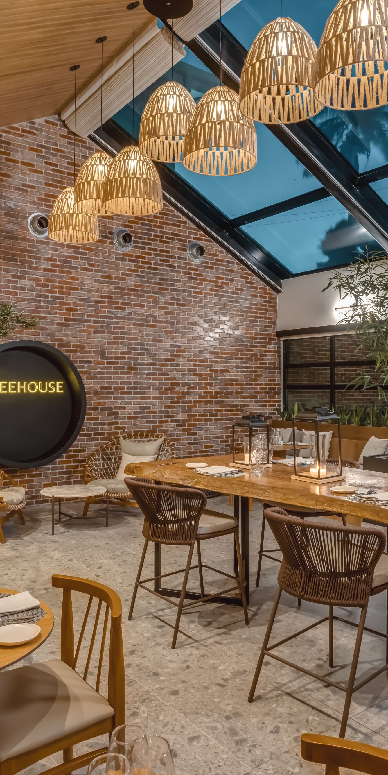 Indoor dining with warm lighting and plants