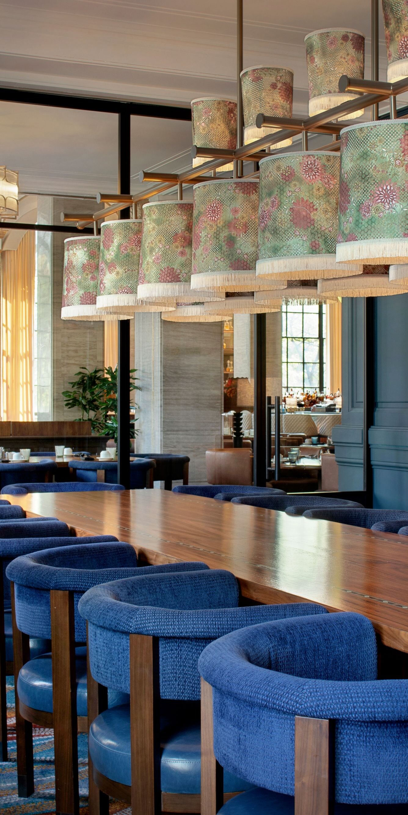 Maker has long farm table seating area.