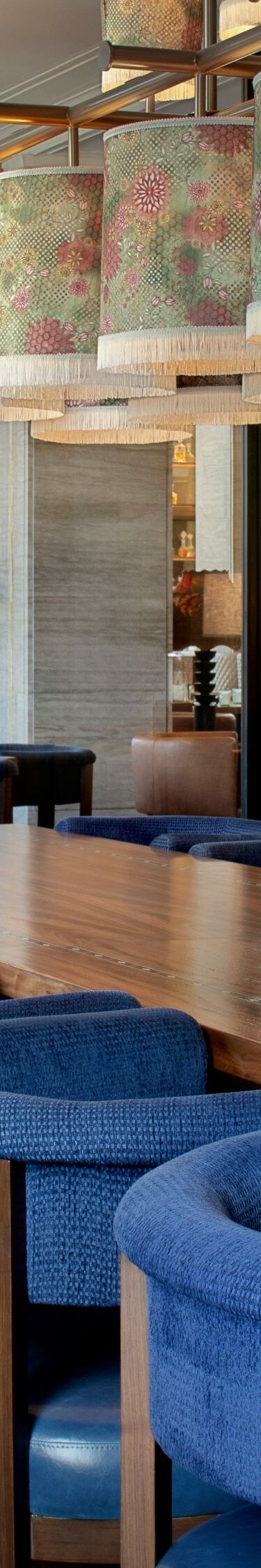 Maker has long farm table seating area.