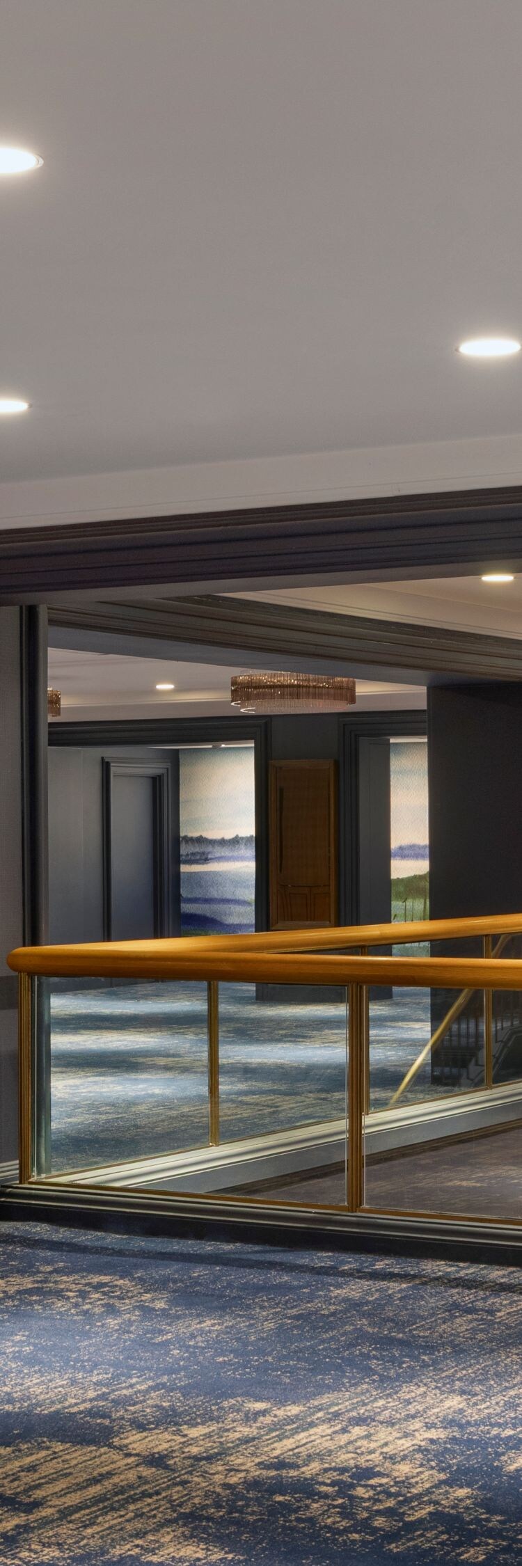 Multi-level meeting space with prominent corridors