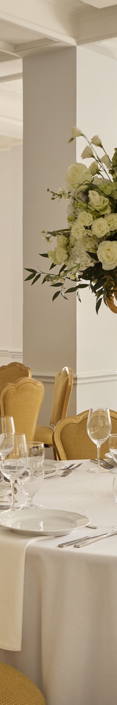 Elegant ballroom with floral centerpieces