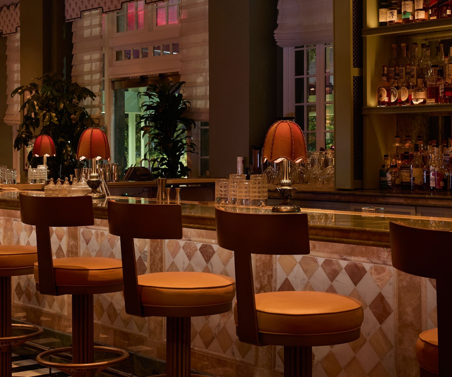 Elegant bar with stools and warm lighting