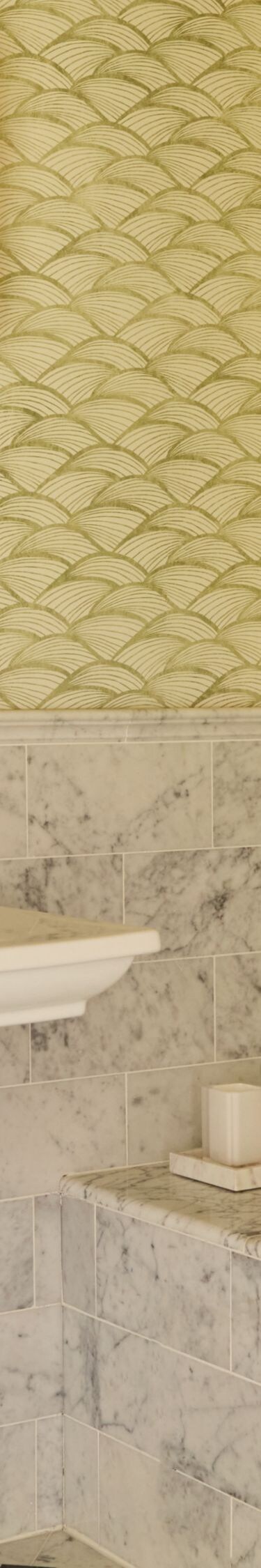 Marble bathroom with soaking tub and mirrors
