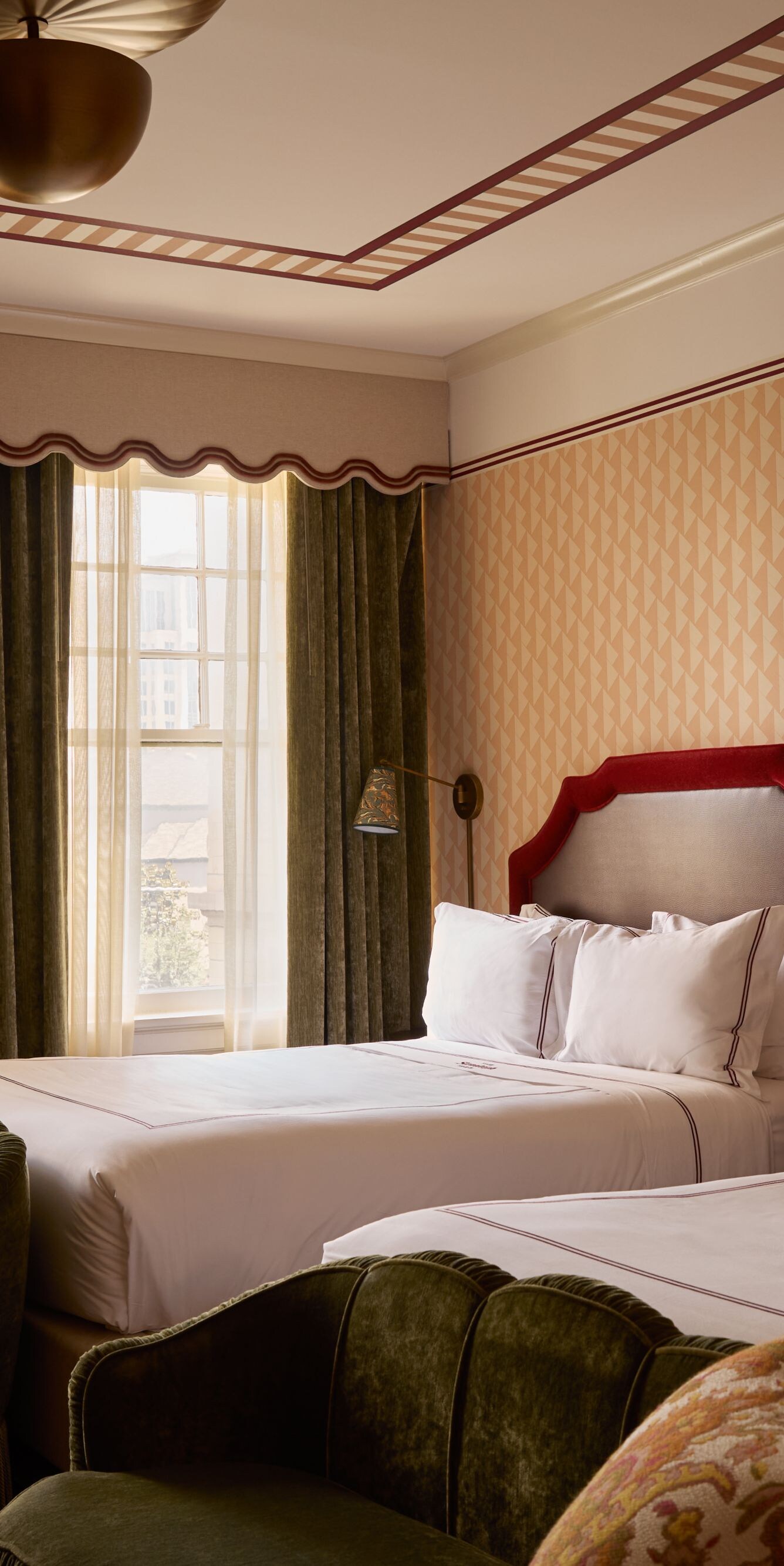 Two queen beds with seating & large windows