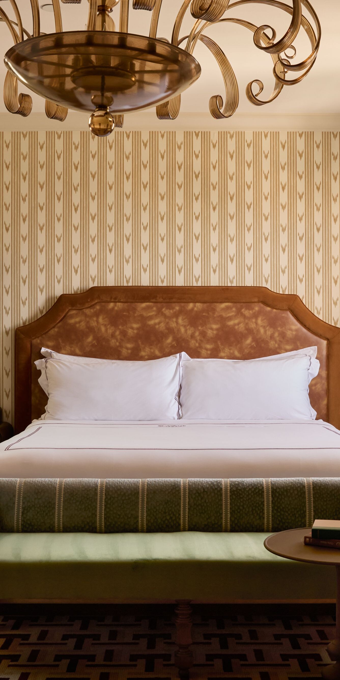 Guest room with king bed and settee