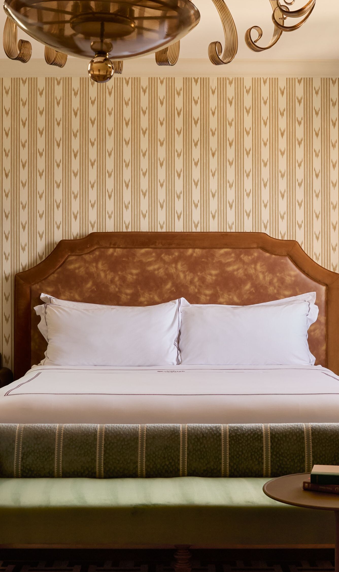 Guest room with king bed and settee