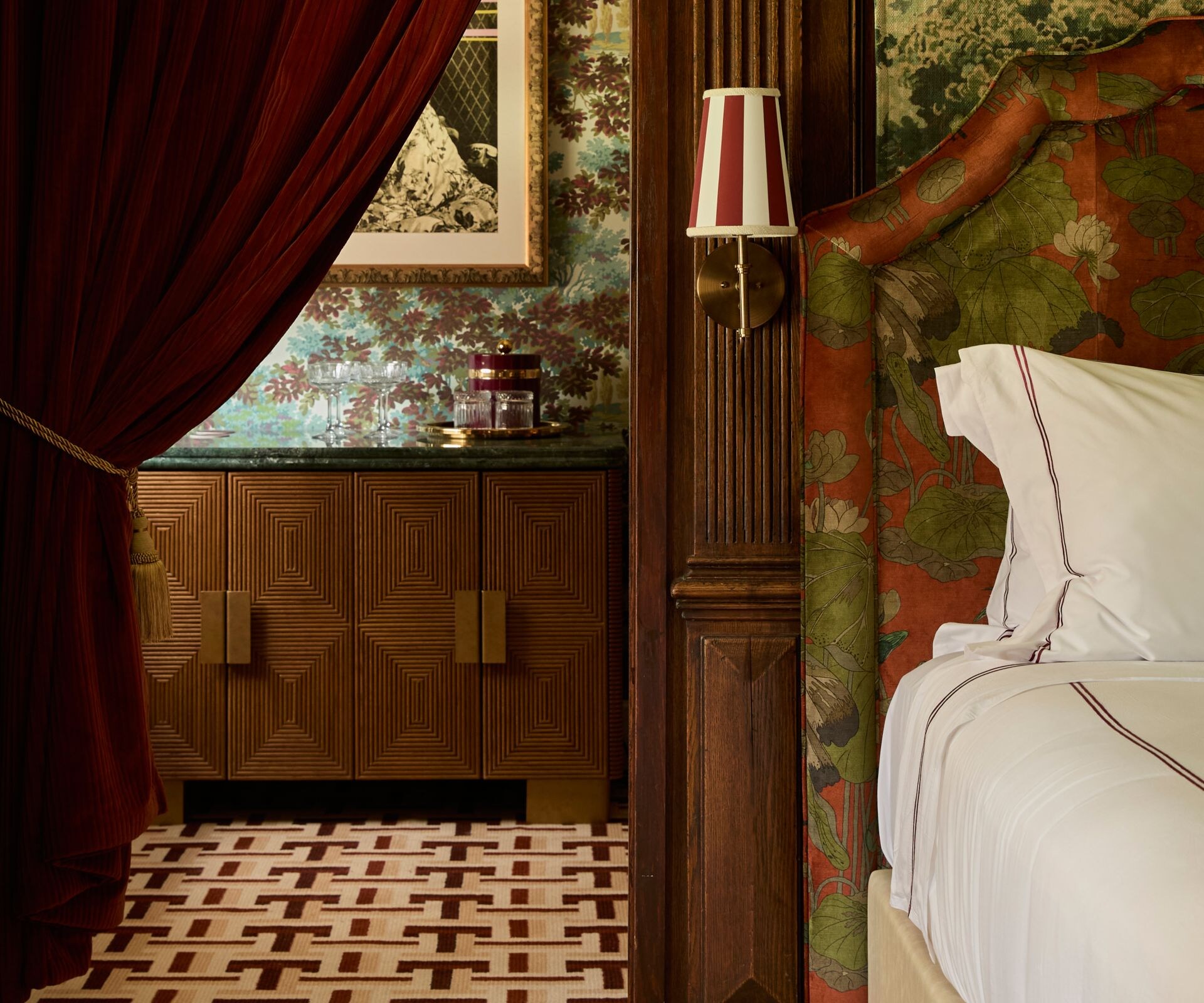 Bedroom with patterned headboard and wood accents