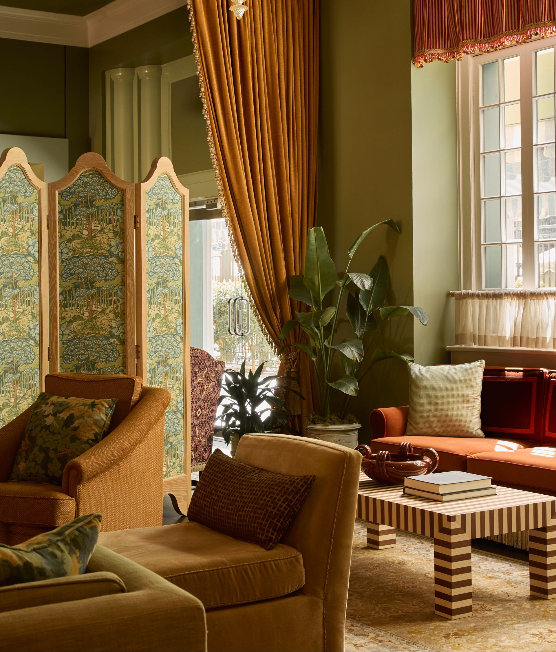 Elegant lounge with chandeliers & velvet seating
