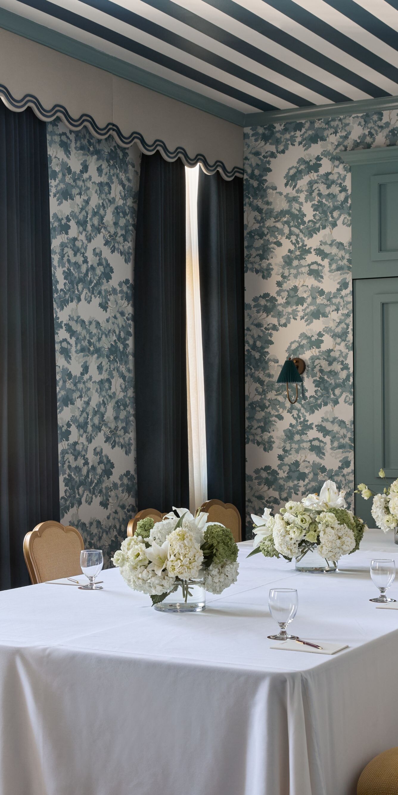 Private meeting room with floral décor and tables