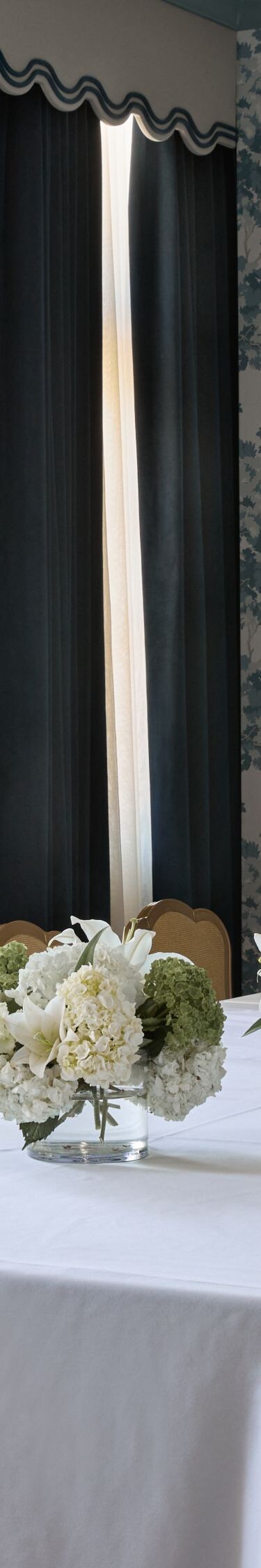 Private meeting room with floral décor and tables