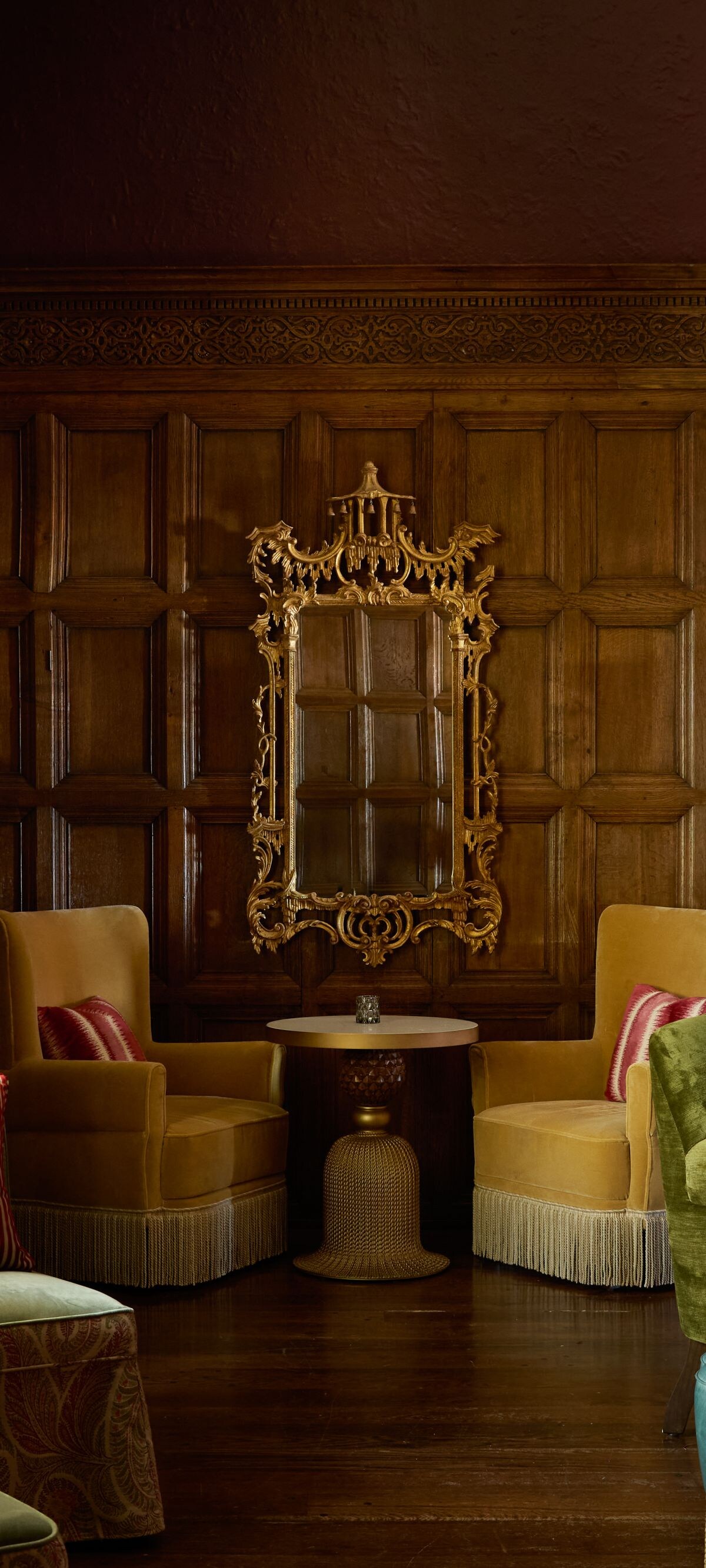 Lounge with fireplace and stained glass windows