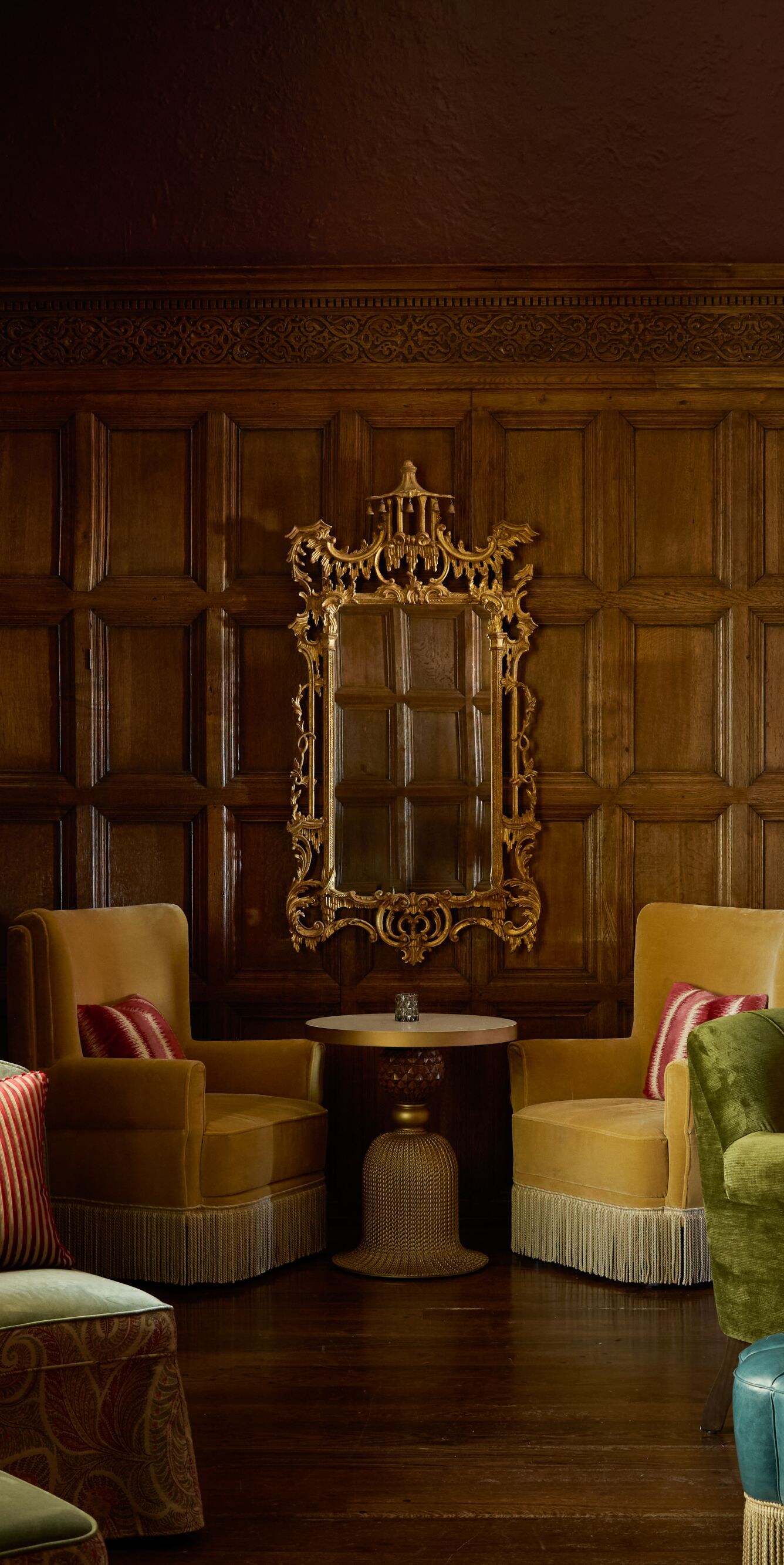Lounge with fireplace and stained glass windows
