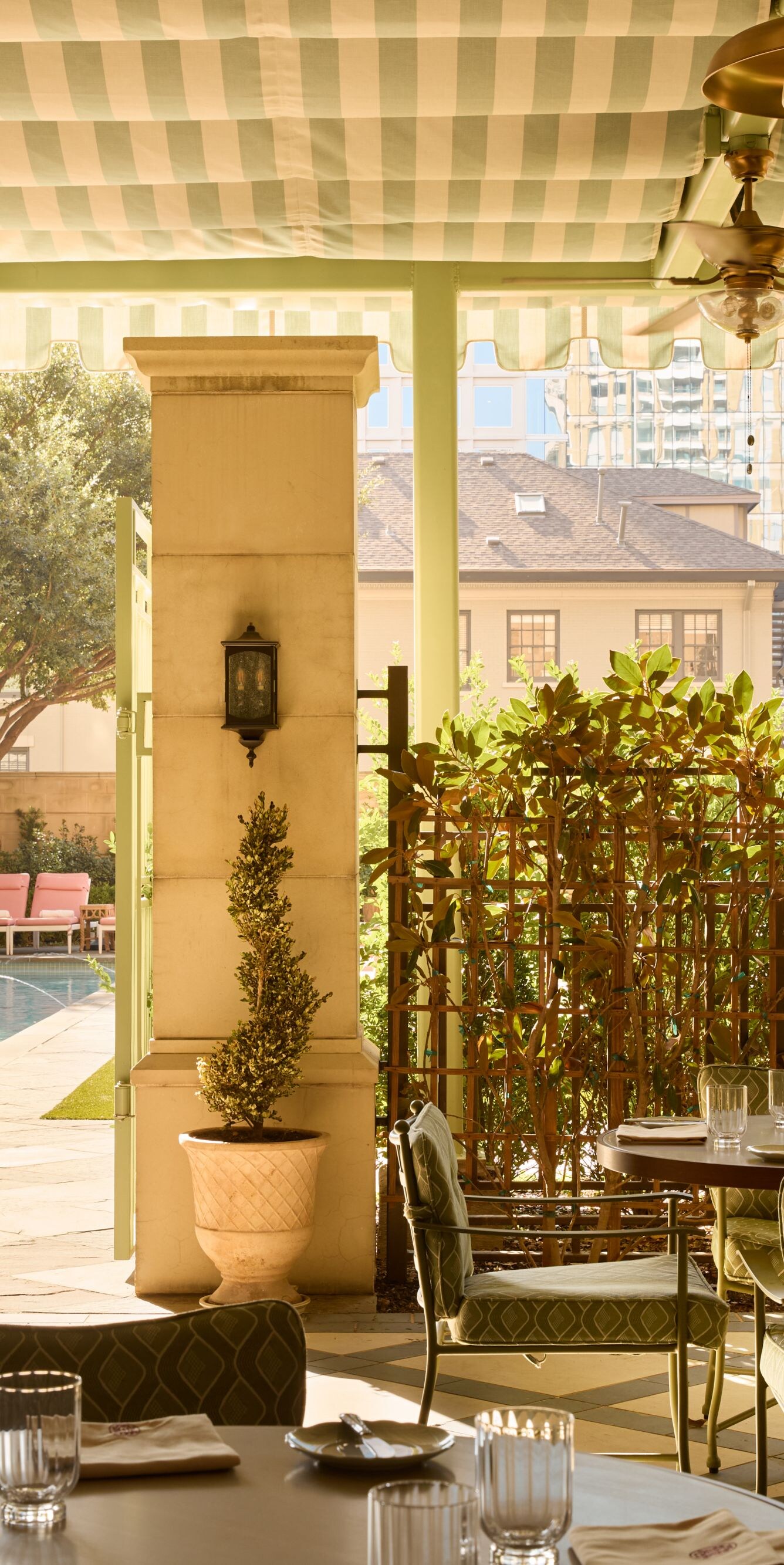 Covered patio dining overlooking the pool area