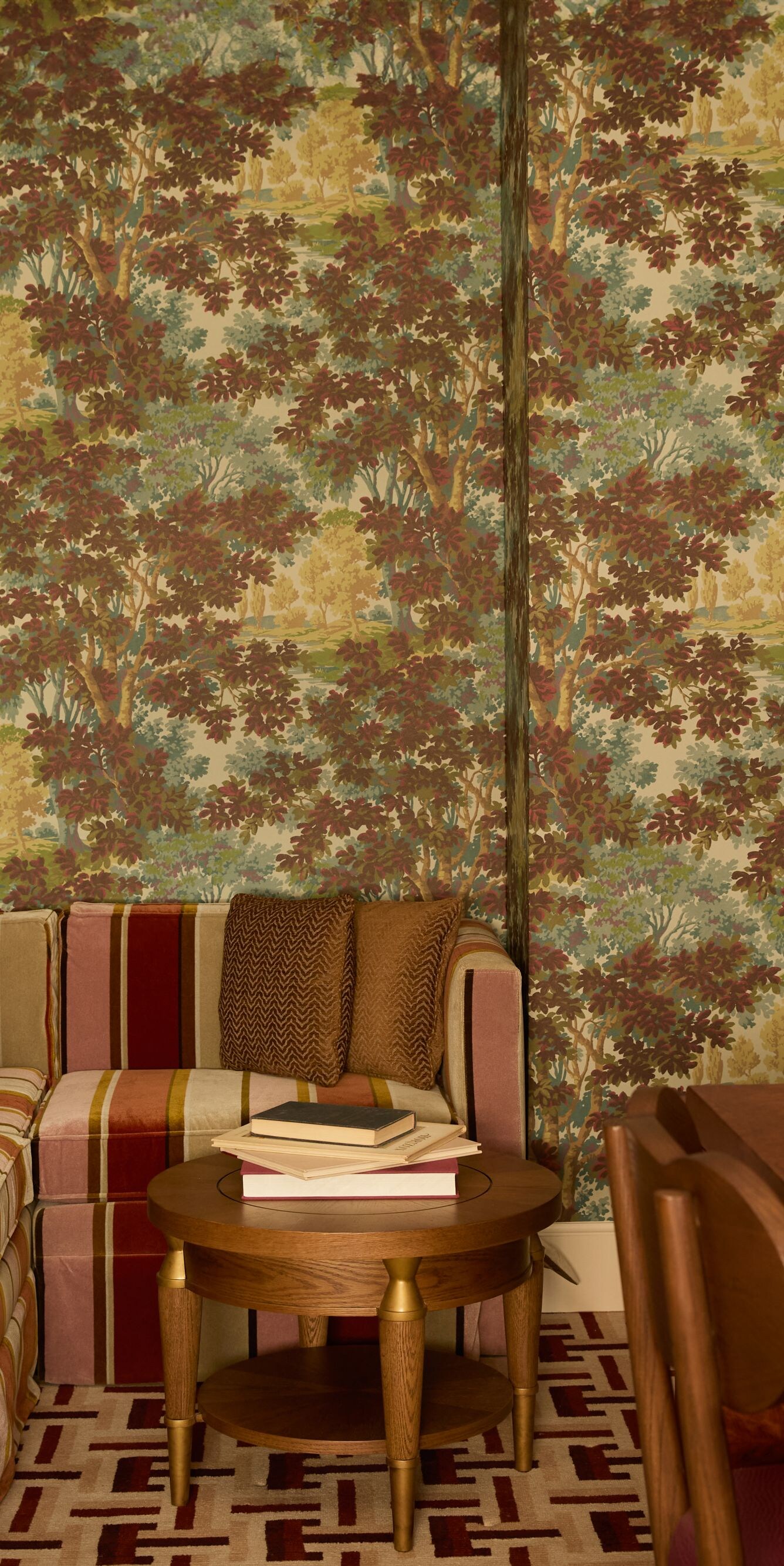 Cozy study nook with desk and patterned walls