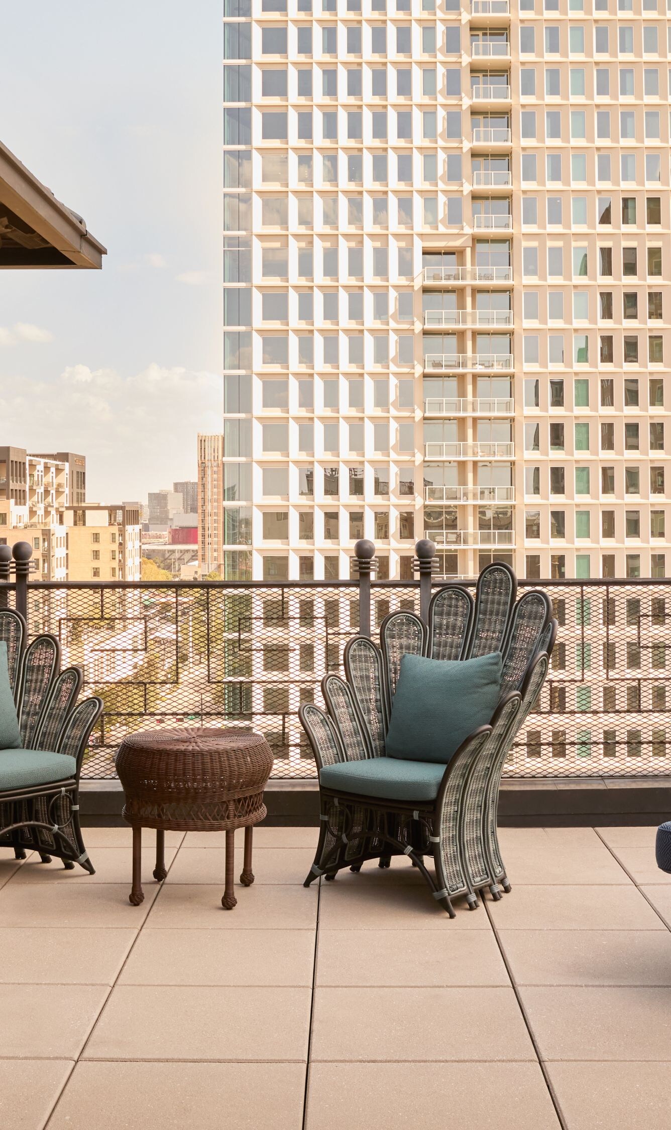 Rooftop terrace with seating and city views