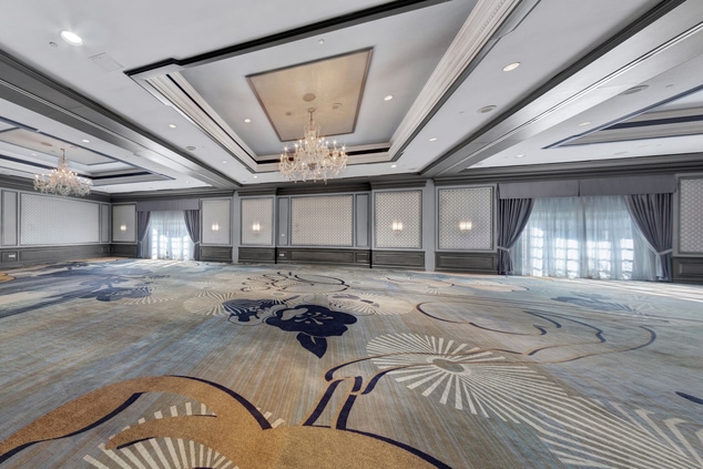 empty ballroom with floor to ceiling windows