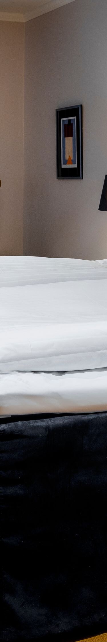 Komfortables Gästezimmer mit Kingsize-Bett