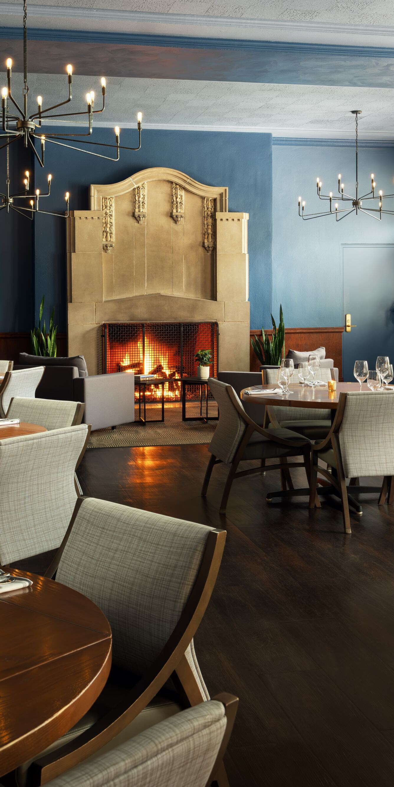 Dining room with lit fireplace