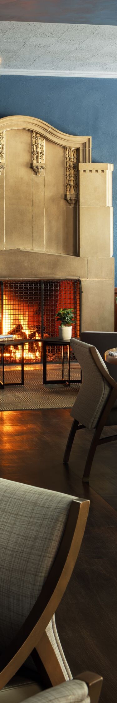Dining room with lit fireplace