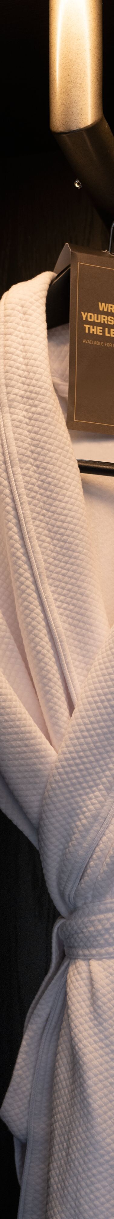 Bathrobe hanging on hanger