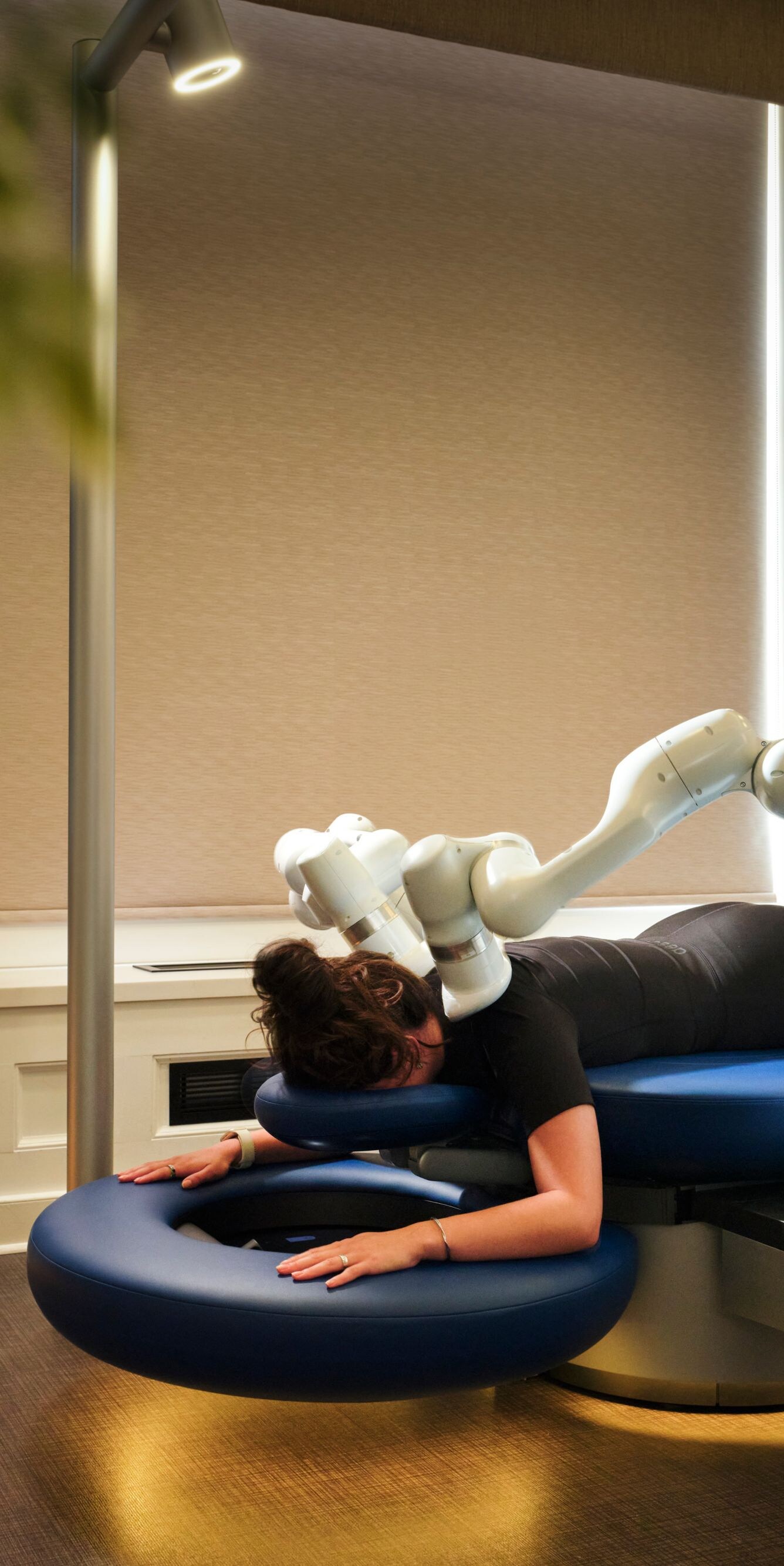 Guest receiving robotic table massage