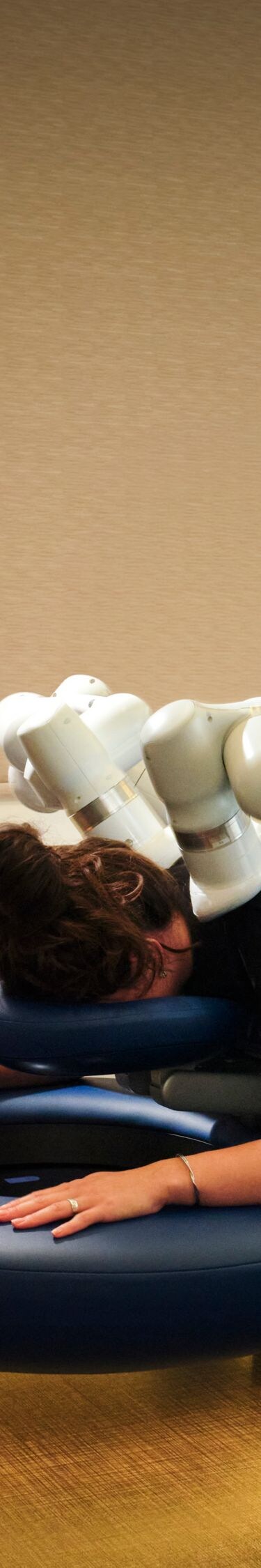 Guest receiving robotic table massage