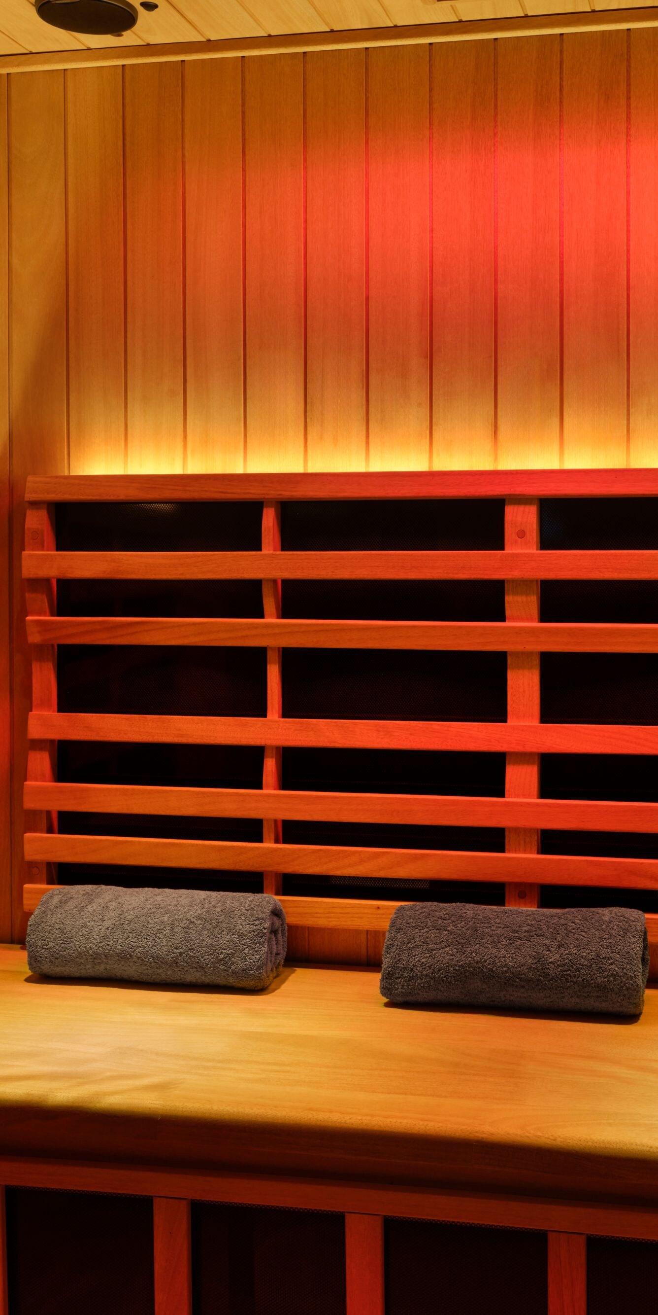 Infrared sauna with wooden bench