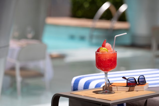close-up cocktail poolside