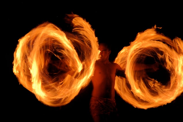 Person spinning fire.