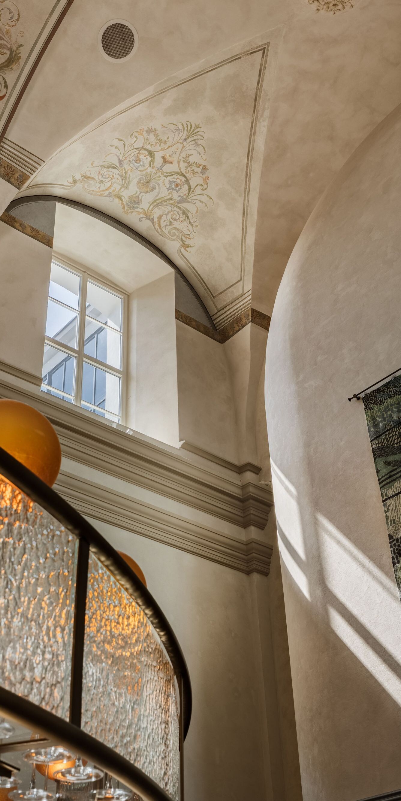 A frescoed ceiling in the bar