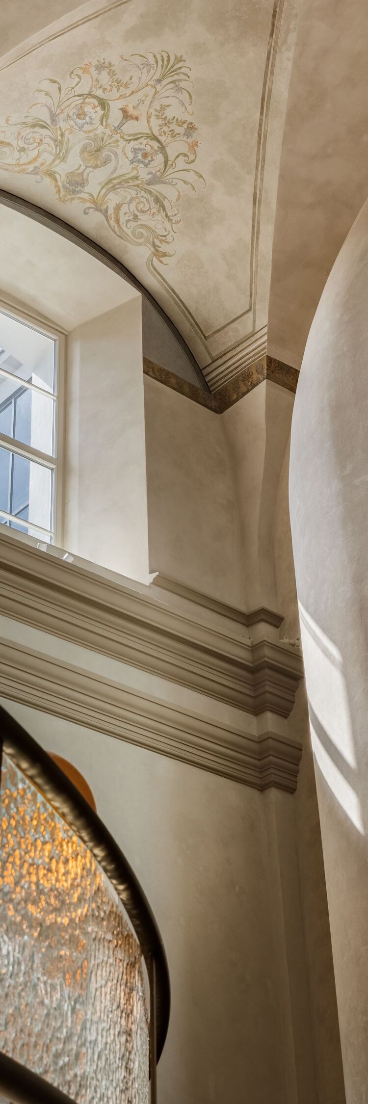 A frescoed ceiling in the bar