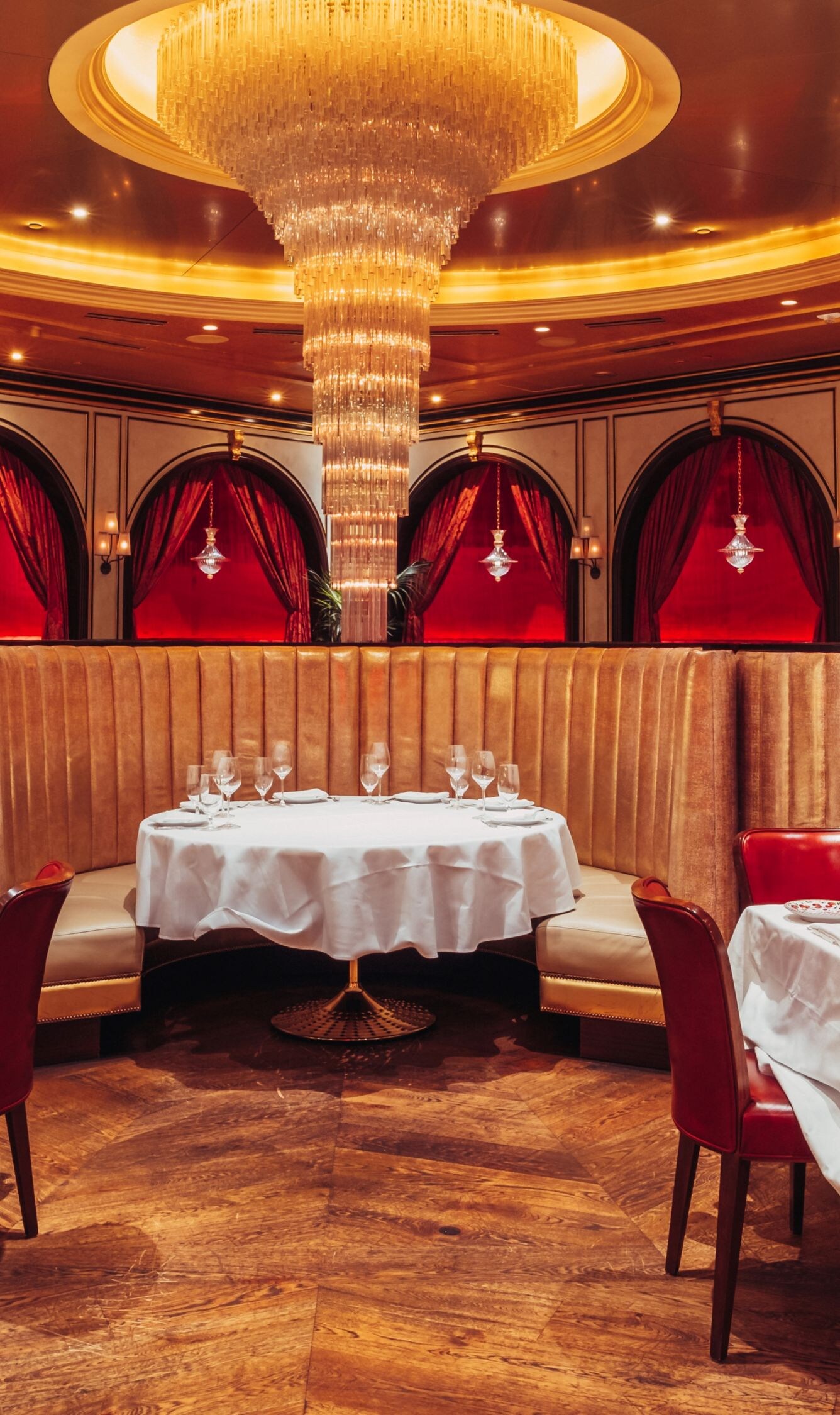 Tables, chairs, bench seating, chandelier