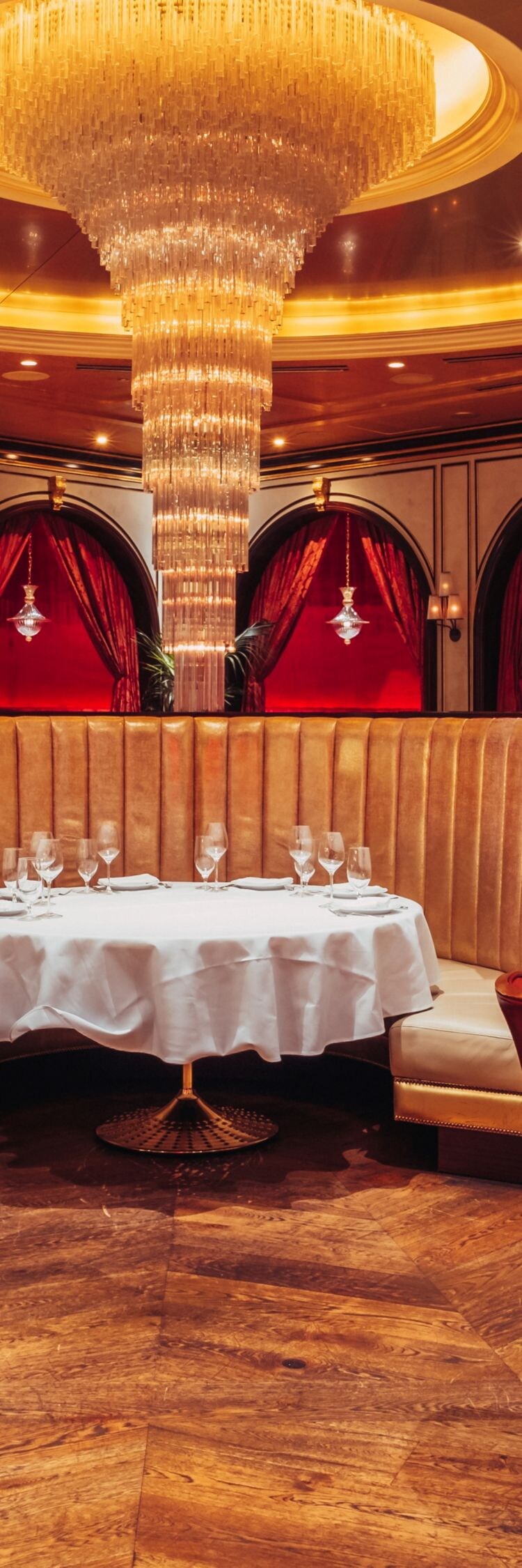 Tables, chairs, bench seating, chandelier