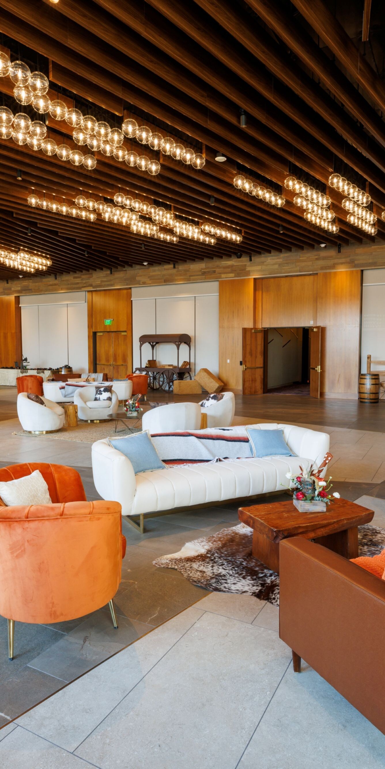 Chairs, sofas, tables in meeting facility.