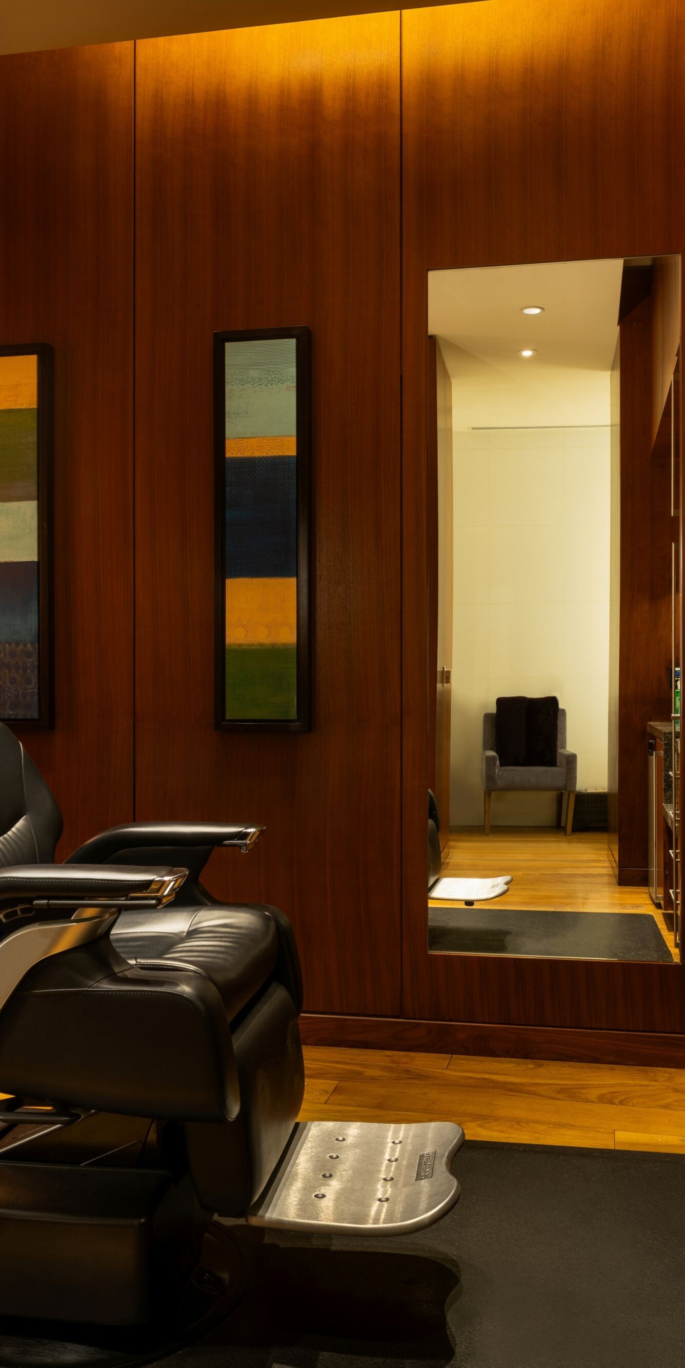 Barbershop chair, counter area, doorway.