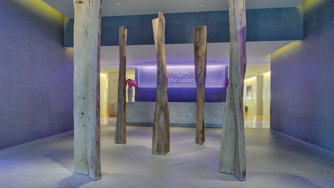 Salon entrance with vertical artwork wood pieces