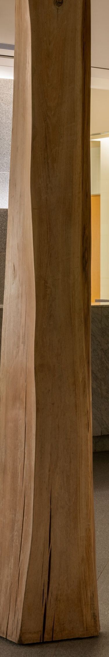 Wood pilars, reception desk, salon sign
