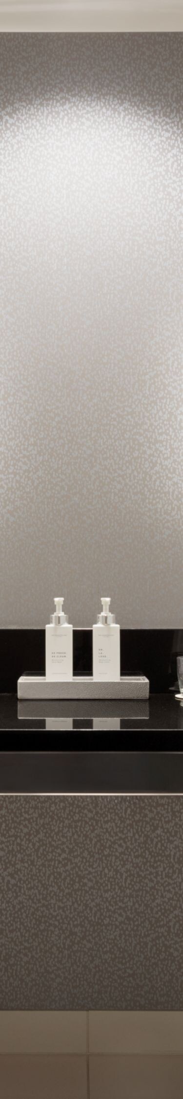 Bathroom, shower, two sinks, two mirrors, towels