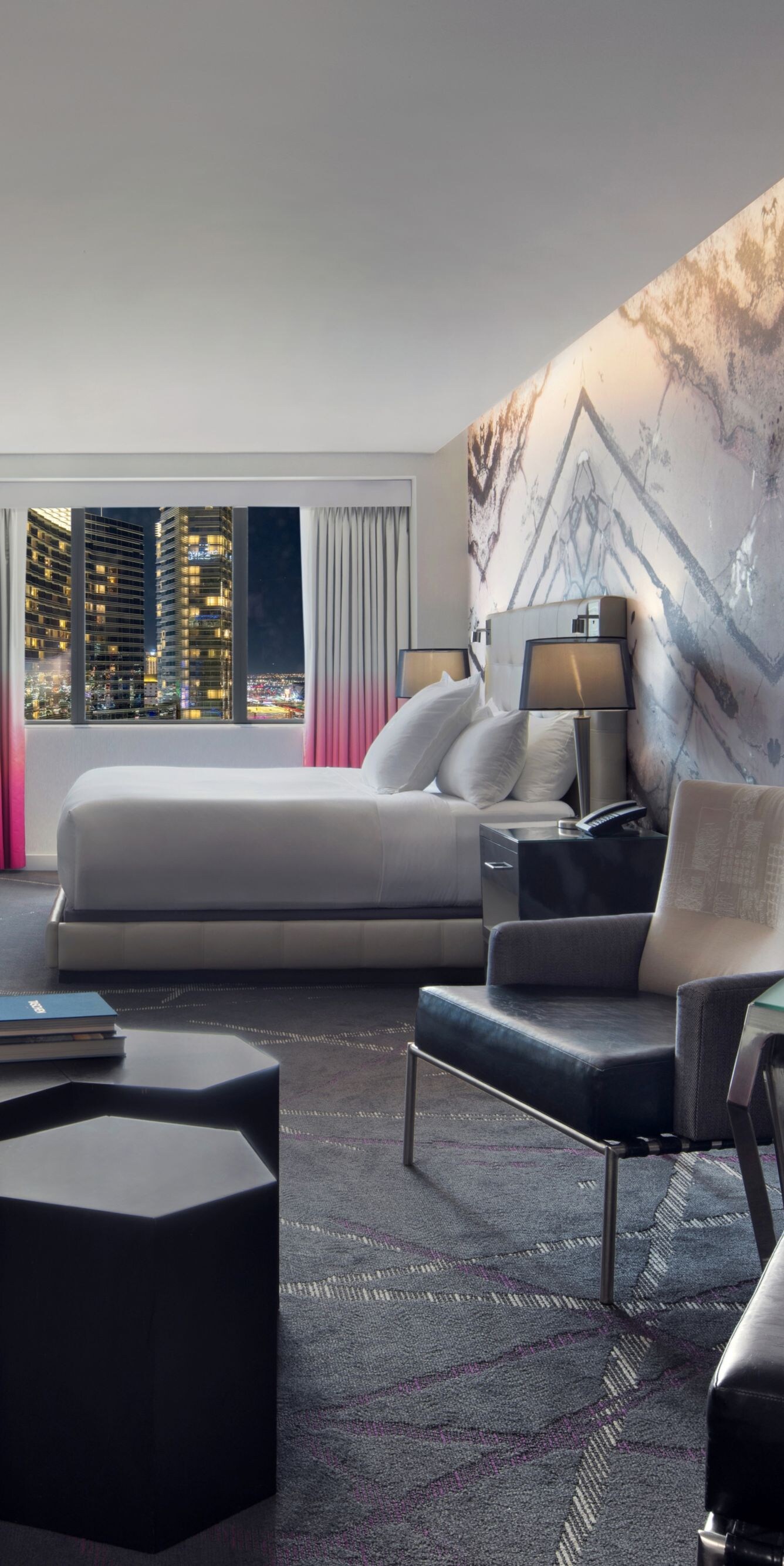 Chairs, TV on wall, tables, sofa, king bed, window