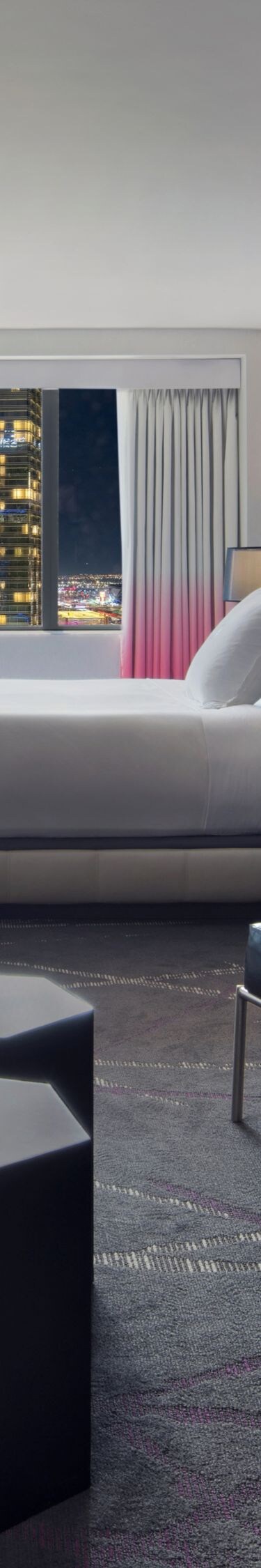 Chairs, TV on wall, tables, sofa, king bed, window
