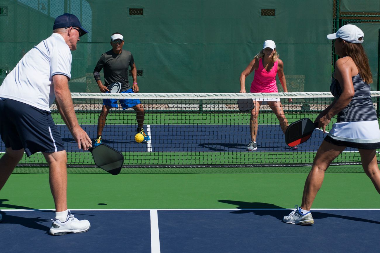 Couples playing pickleball