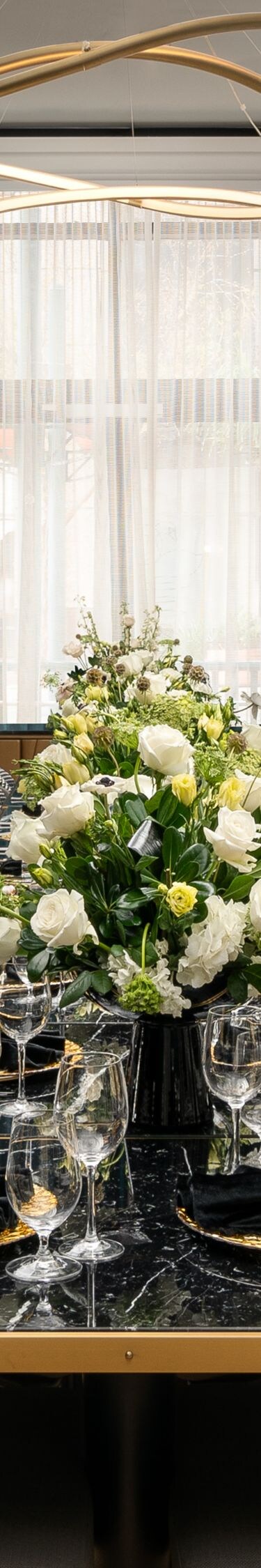 Table with gold, black, and florals
