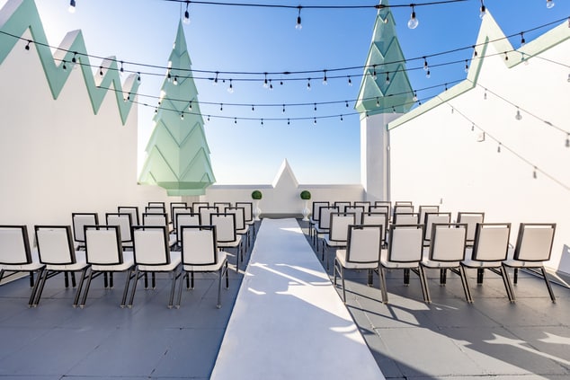 Rooftop terrace with ceremony chairs and aisle 